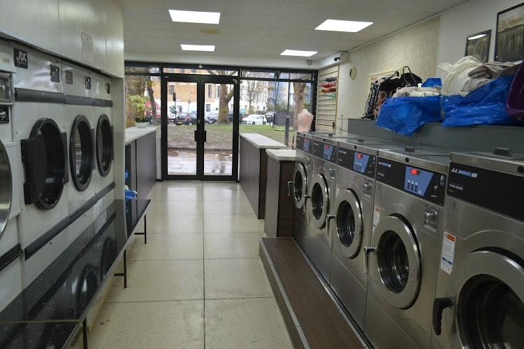 Shine Wash Laundrette dry cleaning tailoring launderette photo